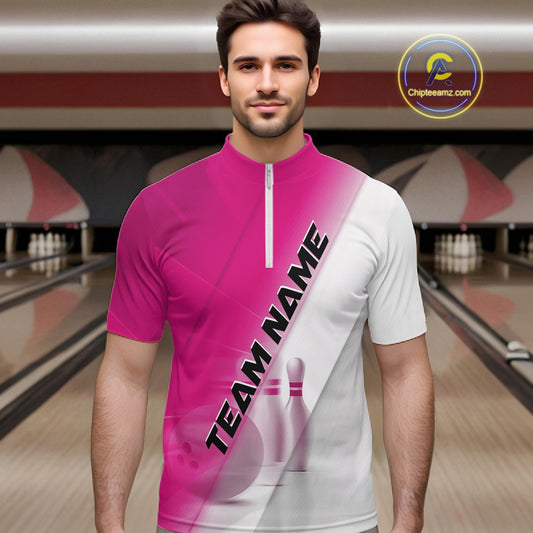 Front view of a male model in a bowling lane wearing a quarter zip shirt with bowling ball and pins in a pink and white diagonal layout.