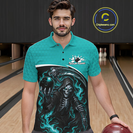 A man wearing a teal and black bowling shirt with a grim reaper graphic, standing in a bowling alley holding a bowling ball.
