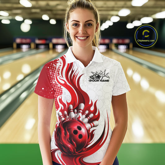 A woman stands in a bowling alley wearing a white and red bowling-themed polo shirt with a large red bowling ball and flame graphic on the front. The background shows blurred bowling lanes, and a circular 'Chipteewanz.