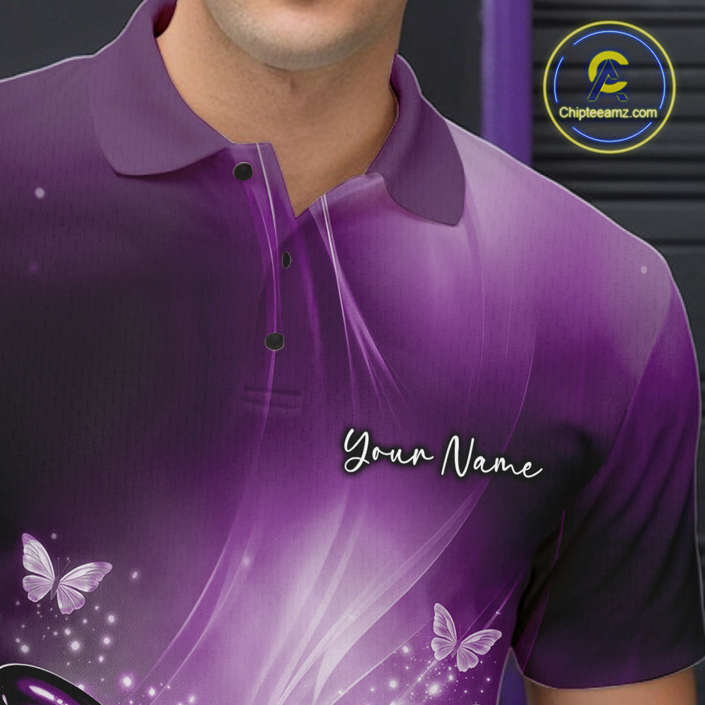 Close-up left chest view of a purple bowling polo shirt featuring a butterfly beside a bowling ball with scattered bowling pins.