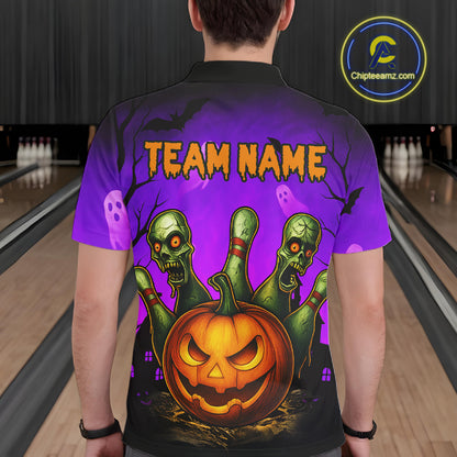 A person viewed from behind wearing a short-sleeve polo shirt with a large Halloween graphic on the back. The design shows a glowing jack-o'-lantern pumpkin, three green zombie hands, purple ghosts, bats, and the text 'TEAM NAME' in orange.