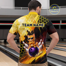 Load image into Gallery viewer, Person wearing a bowling-themed shirt with a cat design in a bowling alley.