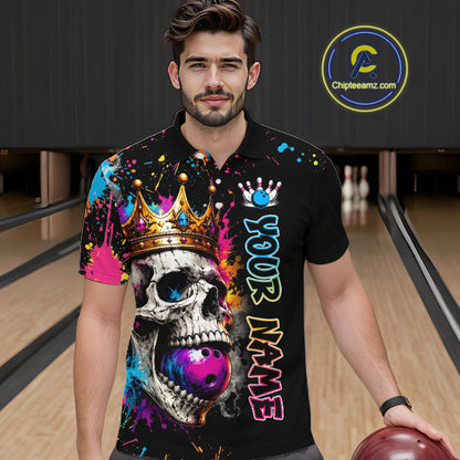 Man wearing a colorful bowling shirt with a skull design in a bowling alley.
