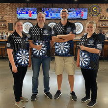 Load image into Gallery viewer, Group of four people in a sports bar wearing matching custom black darts team polo shirts featuring an grey American flag and dartboard design.