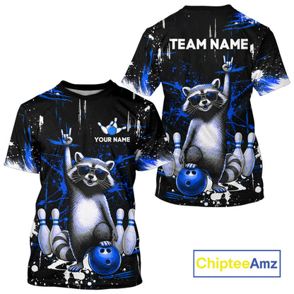 Black and blue t-shirt with raccoon design and customizable text, featuring the brand 'ChipteeAmz'.