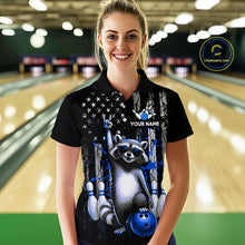 Load image into Gallery viewer, Woman wearing a black shirt with a raccoon design in a bowling alley.