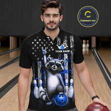 Load image into Gallery viewer, Man wearing a black shirt with a raccoon graphic in a bowling alley, holding a bowling ball.