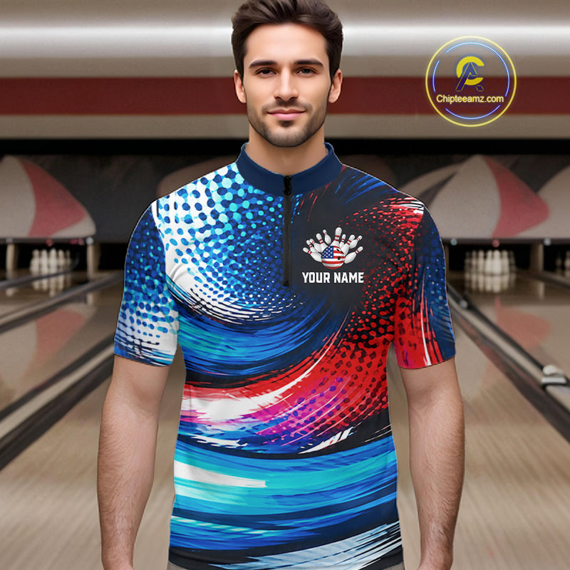 A man wearing a short-sleeve quarter-zip bowling shirt with a vibrant blue, red, and white abstract swirl pattern. The shirt features a black collar and a black chest panel with a white crown graphic and the text 'YOUR NAME'.