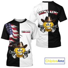 Load image into Gallery viewer, T-shirt with a design of a smiling emoji wearing a cowboy hat and holding guns, on a black and white background with American flag and text space.
