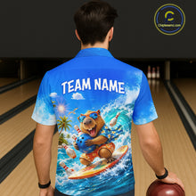Load image into Gallery viewer, Person wearing a blue shirt with a bear bowling design and 'TEAM NAME' text on a bowling alley.