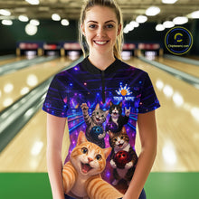 Load image into Gallery viewer, Person wearing a colorful bowling shirt with cat designs in a bowling alley.