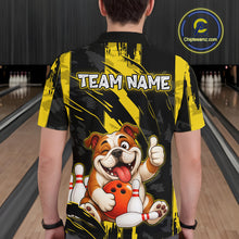 Load image into Gallery viewer, Male model wearing a custom black yellow bulldog bowling polo shirt back view displaying the personalized team name above a playful cartoon bulldog graphic at the bowling alley