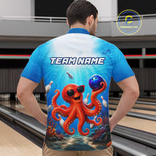 Load image into Gallery viewer, Person wearing a blue shirt with an octopus design and 'TEAM NAME' text in a bowling alley.
