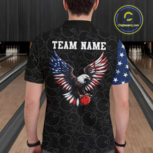 Load image into Gallery viewer, Person wearing a black shirt with an eagle design and 'TEAM NAME' text in a bowling alley.