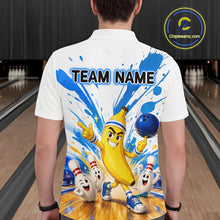 Load image into Gallery viewer, Person wearing a white shirt with a colorful design of a banana character and bowling pins on a bowling alley background.