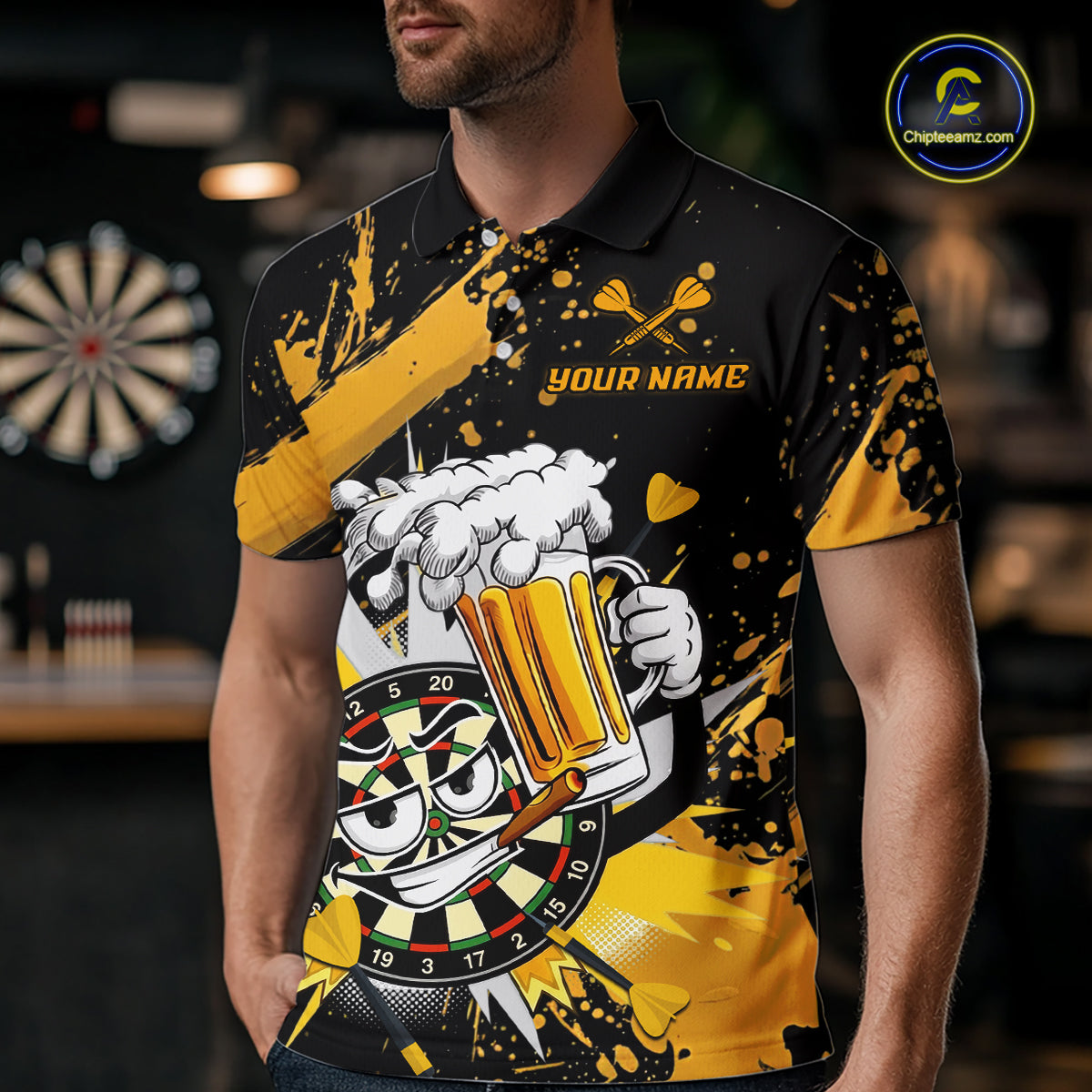 A man wearing a black and yellow short-sleeve polo shirt with a cartoon beer mug, dartboard, and splatter graphic. The shirt has 'YOUR NAME' printed on the chest, and a 'Chipstreamz' logo is visible in the top right corner.