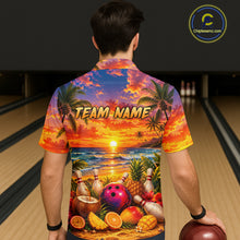 Load image into Gallery viewer, Person wearing a colorful bowling shirt with a tropical design and 'TEAM NAME' text in a bowling alley.