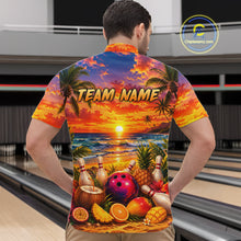 Load image into Gallery viewer, Person wearing a colorful bowling shirt with a beach scene and 'TEAM NAME' text in a bowling alley.