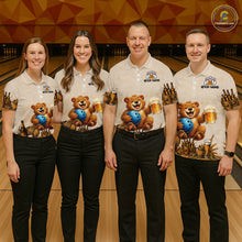 Load image into Gallery viewer, Four people wearing matching polo shirts with a bear and beer design in a bowling alley.