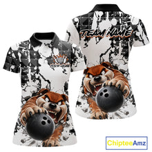 Load image into Gallery viewer, Polo shirt with cartoon dog holding bowling balls and 'Team Name' text on a white background