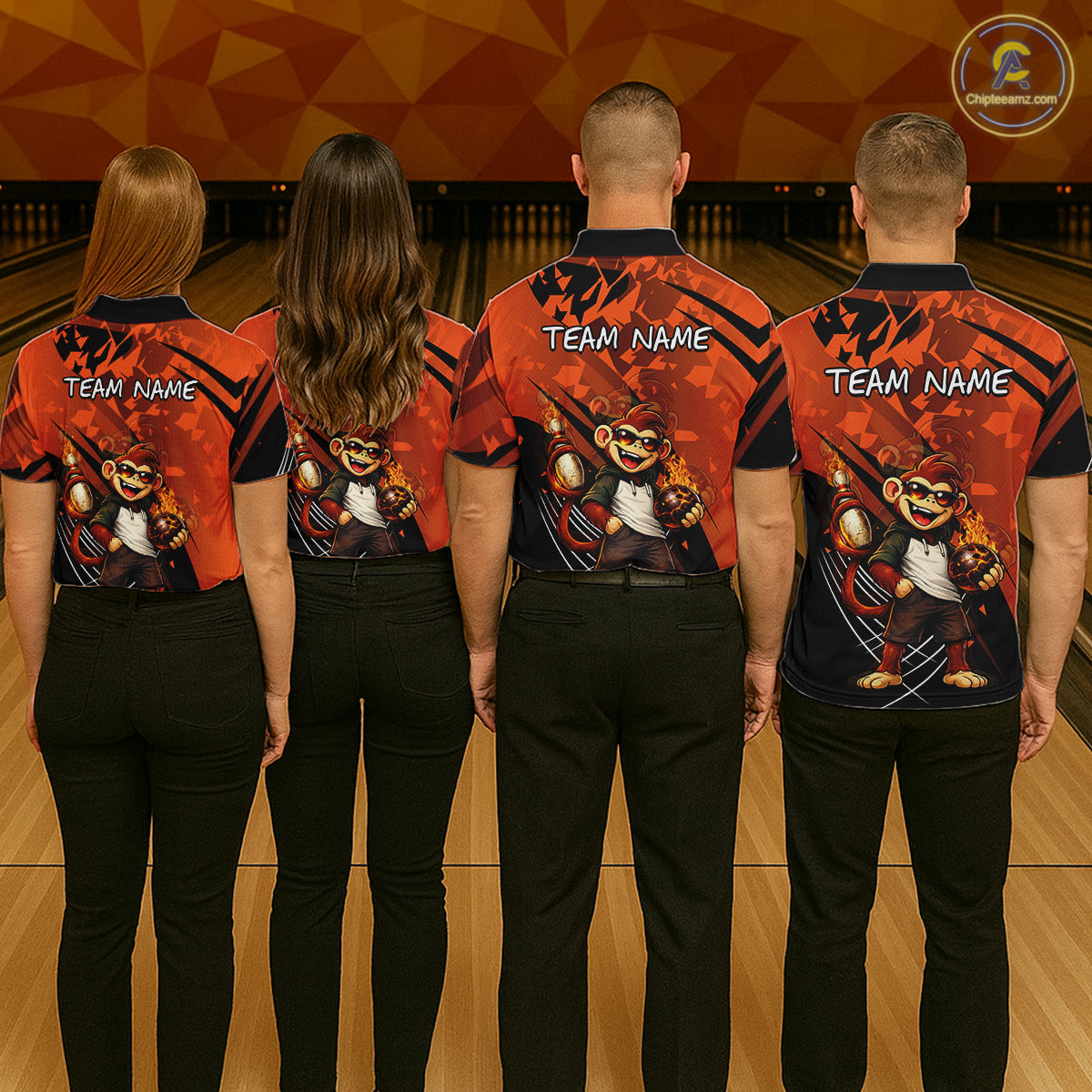Four people standing with their backs to the camera in a bowling alley, wearing matching custom bowling shirts with a cartoon monkey graphic and 'TEAM NAME' text. The shirts are orange and black with black patterns.