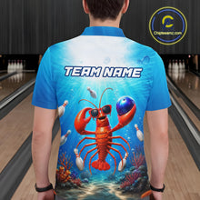 Load image into Gallery viewer, Person wearing a blue bowling shirt with a lobster design and 'TEAM NAME' text at a bowling alley.
