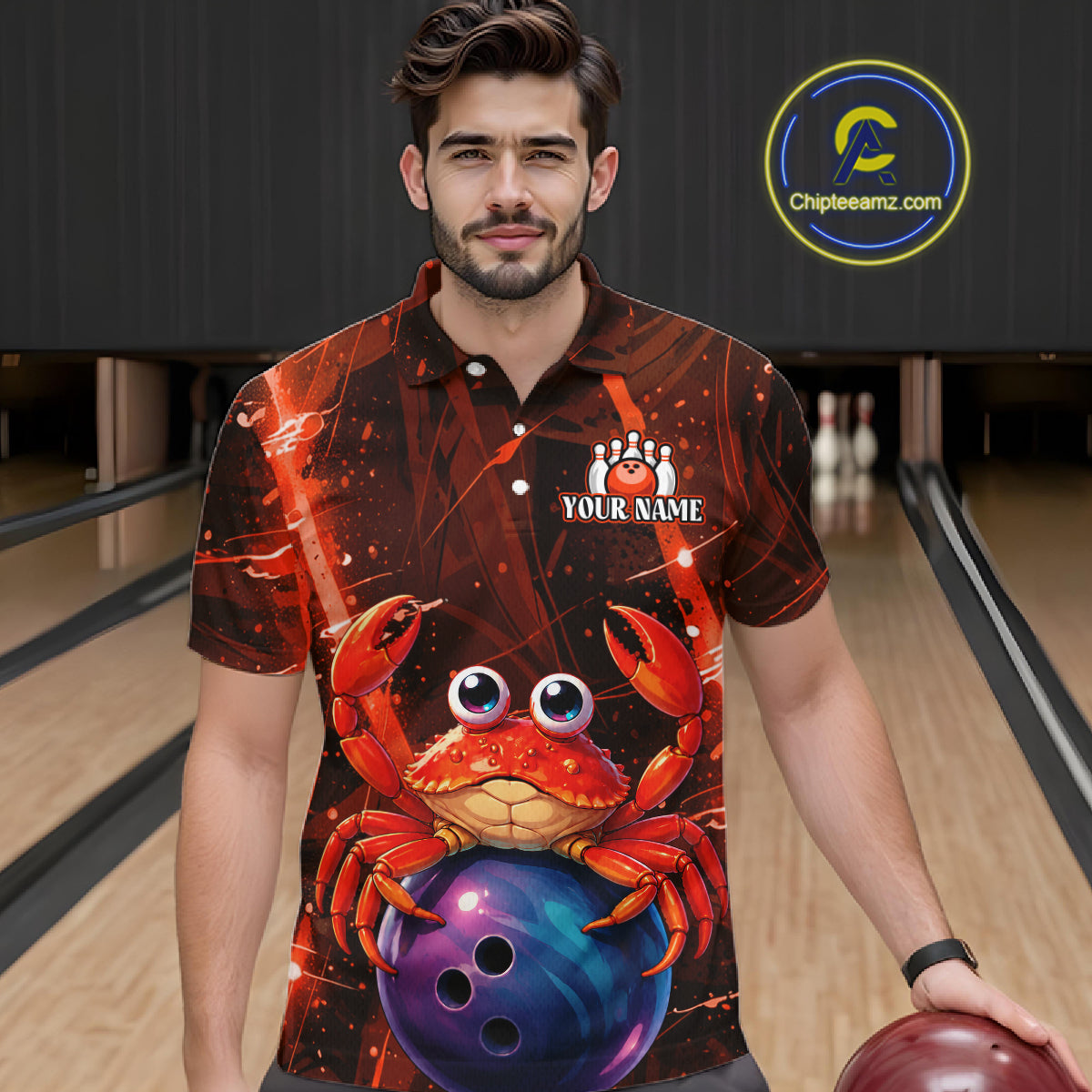 Man wearing a bowling shirt with a crab design in a bowling alley.