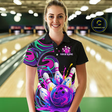 Load image into Gallery viewer, Person wearing a colorful bowling shirt with a design of a bowling ball and pins in a bowling alley.