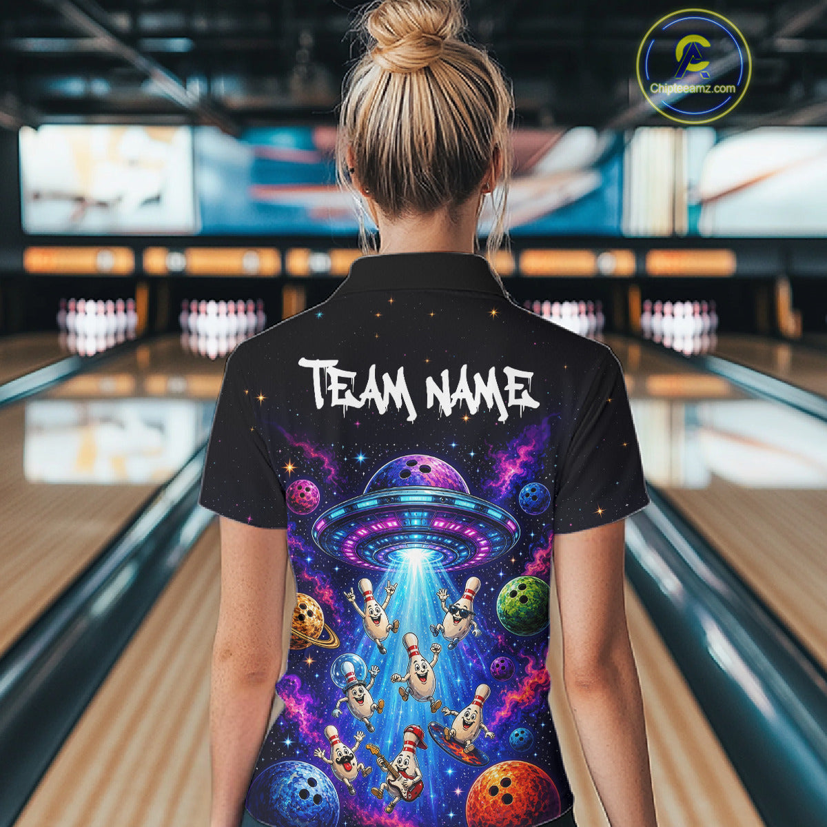 Person wearing a colorful bowling shirt with 'Team Name' text in a bowling alley.