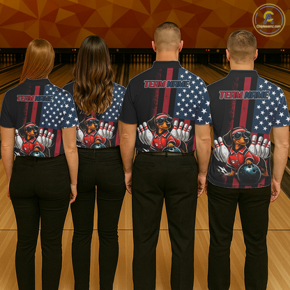 Four people wearing matching bowling-themed shirts with an American flag design on a bowling alley.