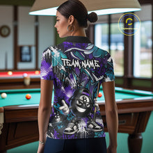 Load image into Gallery viewer, Person wearing a colorful polo shirt with a pool ball design in a billiards room.