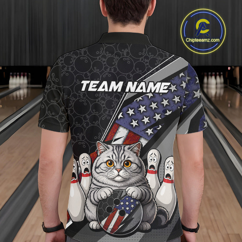 A man wearing custom black patriotic cat bowling polo shirt back view featuring an American flag, bowling ball and honeycomb pattern, displaying Team Name, at the bowling alley