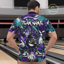 Load image into Gallery viewer, Man wearing a colorful bowling shirt with a cartoon bowling ball design in a bowling alley.