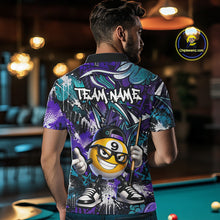 Load image into Gallery viewer, Man wearing a colorful polo shirt with a pool ball design in a bar setting