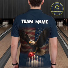 Load image into Gallery viewer, Man wearing custom navy patriotic bowling polo shirt back view featuring a bald eagle and American flag, displaying Team Name, at the bowling alley