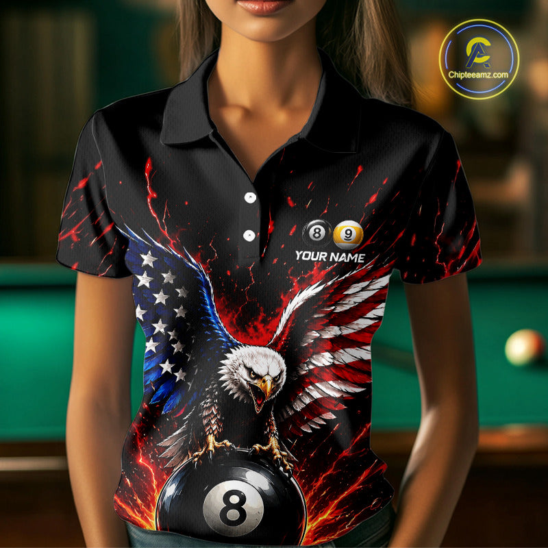 Person wearing a black polo shirt with an eagle and billiard ball design, featuring the American flag.