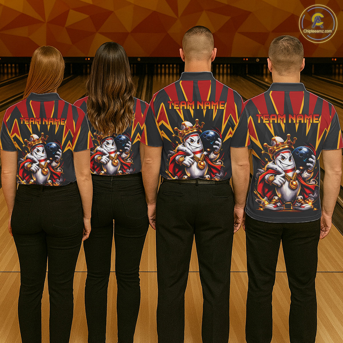 Four people wearing matching bowling shirts with a team logo on a bowling alley.