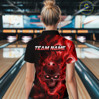 Woman wearing a black bowling quarter zip shirt featuring a flaming skull with glowing red eyes, red smoke effects, and custom “TEAN NAME” text