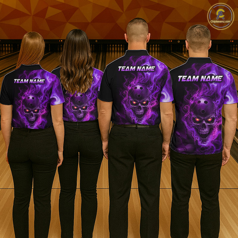 Four people wearing purple shirts with a skull design on a bowling alley.