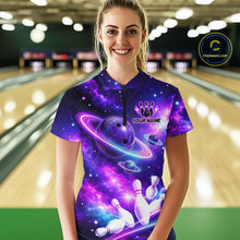 Load image into Gallery viewer, Woman wearing a colorful bowling shirt with galaxy design and personalized text in a bowling alley.
