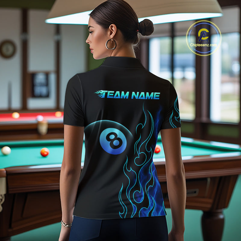 Women wearing billiards polo shirt featuring an eight ball design surrounded by flowing blue flame graphics on a black background.