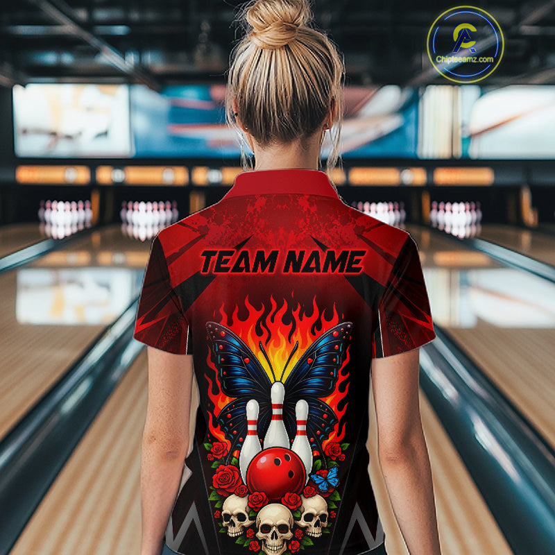 Woman wearing a red and black bowling polo shirt featuring flaming bowling pins, a red bowling ball, a blue butterfly, roses, skulls, and custom team name text.