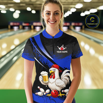 Woman wearing a blue and black bowling quarter zip featuring a chicken holding a beer mug, red bowling ball, scattered pins, and custom your name text.