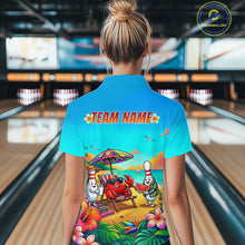 Load image into Gallery viewer, Person wearing a blue shirt with a colorful design and 'TEAM NAME' text in a bowling alley.
