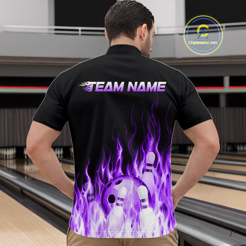 Person wearing a black bowling shirt with purple flame design and 'TEAM NAME' text in a bowling alley.