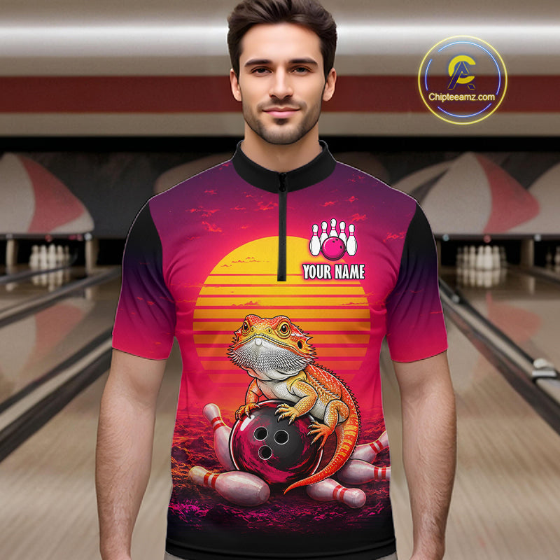 Men’s retro sunset bearded dragon bowling quarter zip shirt, front view on male model in bowling lane 