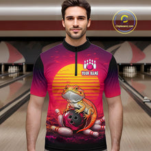 Load image into Gallery viewer, Men’s retro sunset bearded dragon bowling quarter zip shirt, front view on male model in bowling lane 