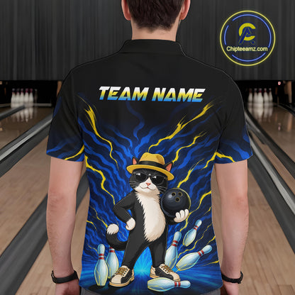 A man shown from behind wearing a black short-sleeve bowling-themed polo shirt with a large graphic of a black-and-white cat wearing a yellow hat and sunglasses, holding a bowling ball, with blue lightning effects and bowling pins. The shirt has 'TEAM NAME' printed across the upper back.