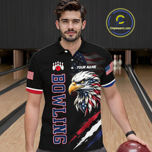 Load image into Gallery viewer, Man wearing a black bowling shirt with an eagle design in a bowling alley.