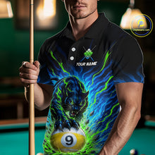 Load image into Gallery viewer, Person wearing a black polo shirt with a panther and pool ball design, holding a pool cue in a billiards setting.